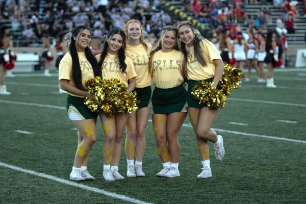 The Cypress Falls High School Cheer Team raised approximately $885 for St. Jude Children's Research Hospital by selling t-shirts and accessories in honor of Childhood Cancer Awareness month.